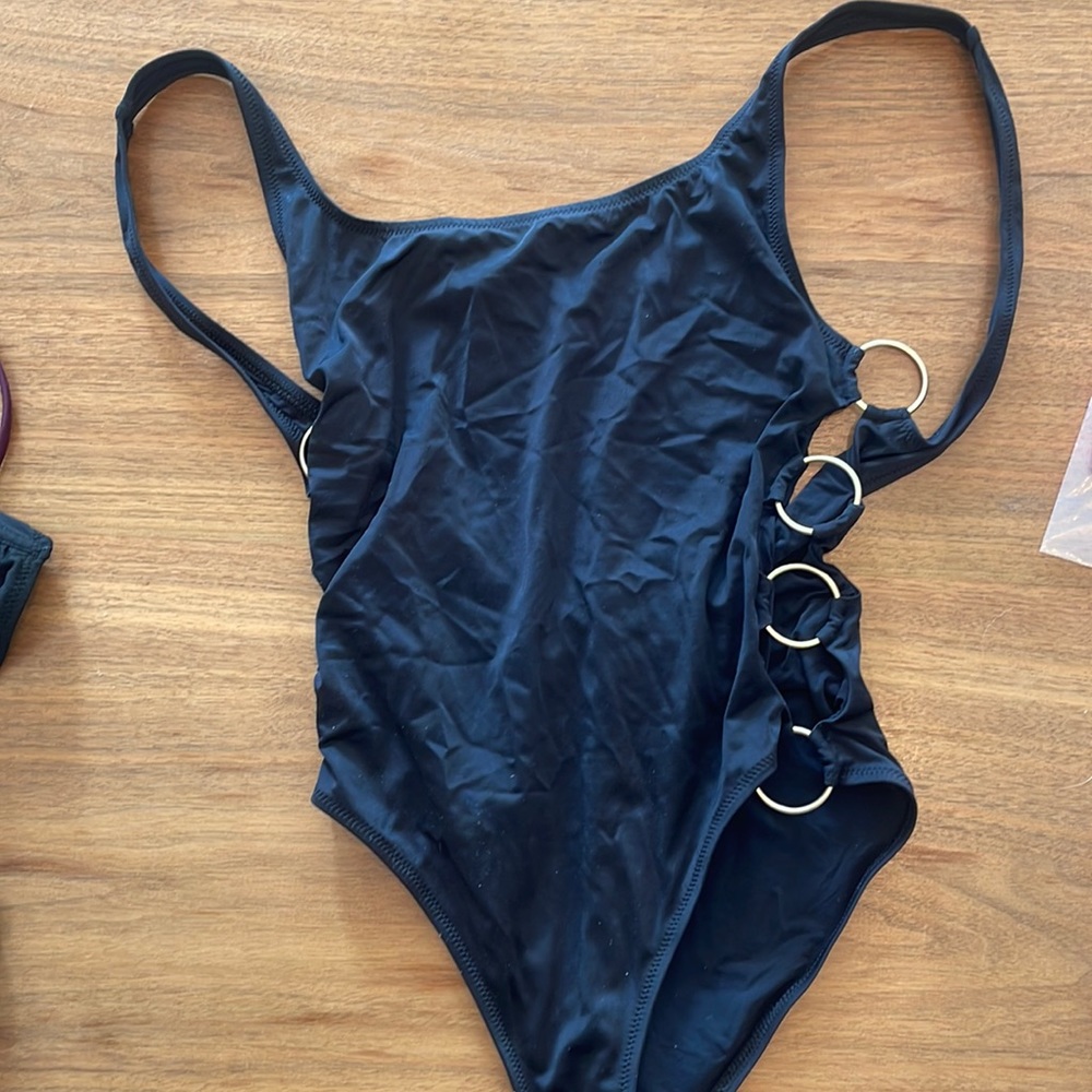 Solid and striped Jennifer swimsuit with gold hardware
